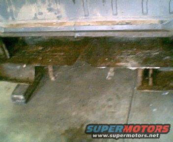 Rusted rear bumper and frame of a vehicle