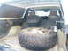 1978 Ford Bronco - Spare tire takes up most of the cargo space in this 1978 Ford Bronco interior.