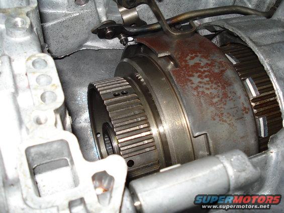 Close-up of a rusty transmission clutch pack with splined input shaft