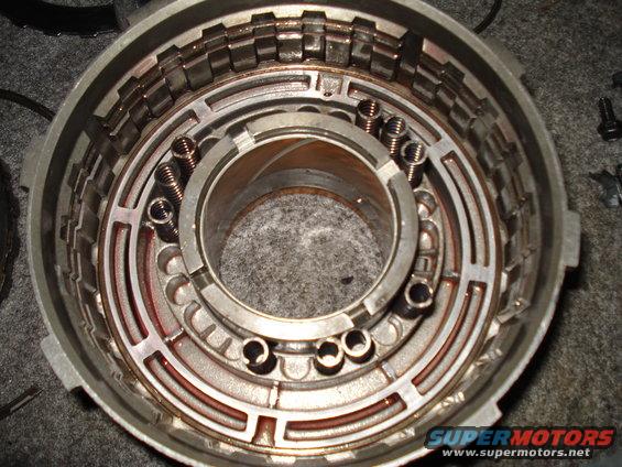 Automatic transmission drum with clutch plates and springs visible