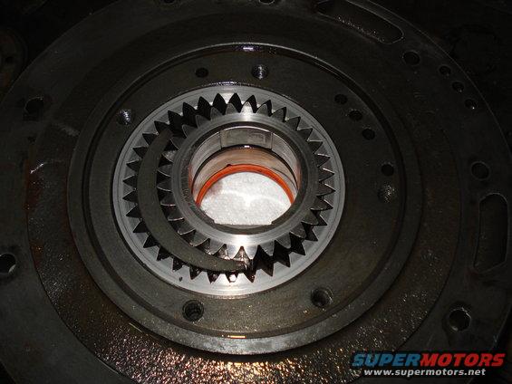 Close-up of a transmission planetary gear set with a damaged sun gear