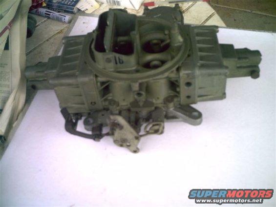 Close-up of a Holley carburetor with a '16' marking