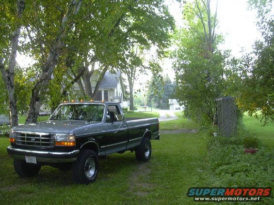 1992 Ford F-250 parked in a grassy yard