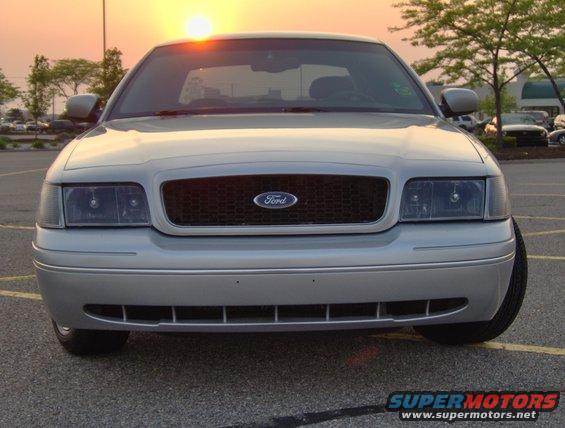 Silver 2002 Ford Crown Victoria front view with grille and headlights
