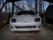 1994 Dodge Stealth - Front view of a white 1994 Dodge Stealth R/T Twin Turbo, showing its distinctive headlights and grille.