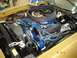 1972 Ford Ranchero - Close-up view of a vehicle's engine compartment, showing various components and wiring.
