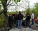1991 Ford Bronco - Group of people gathered around a 1991 Ford Bronco in an outdoor setting.