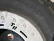 1983 Ferrari Enzo - Tire and wheel assembly showing tire size and wheel details.
