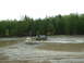 1991 Ford Bronco - This 1991 Ford Bronco is navigating through a challenging muddy terrain.