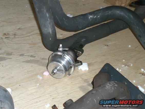 Turbocharger wastegate attached to exhaust piping