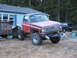 1976 GMC Sierra 2500 - This modified 1976 GMC Sierra 2500 pickup truck features a lifted suspension and large off-road tires.