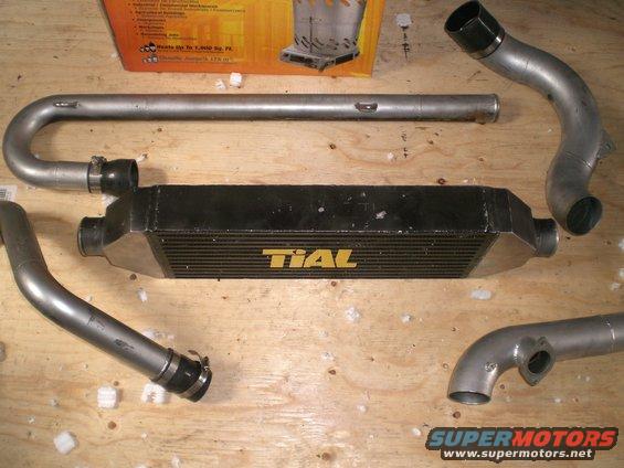 Intercooler with TIAL branding and associated piping