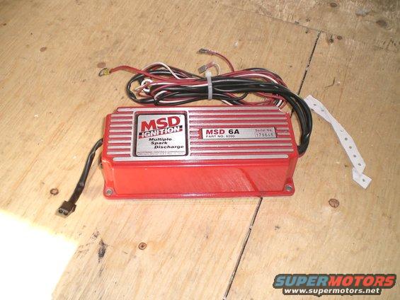 Red MSD 6A ignition box with wiring and labels