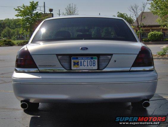 Silver 2002 Ford Crown Victoria rear view with Michigan license plate