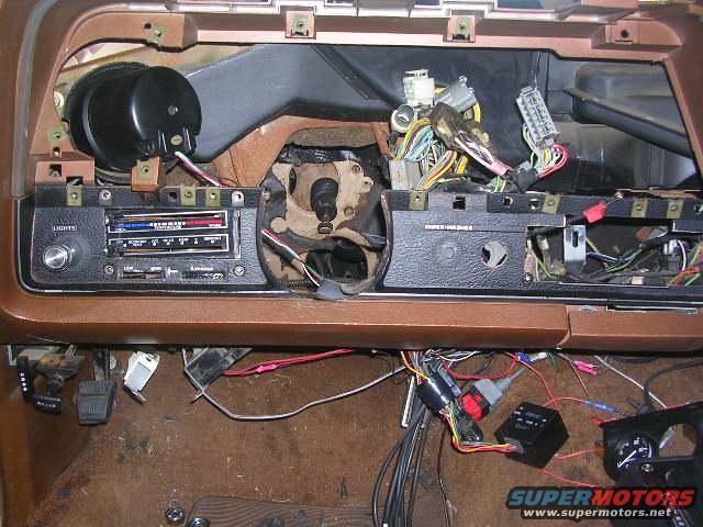 Dashboard wiring and components removed from a vehicle interior