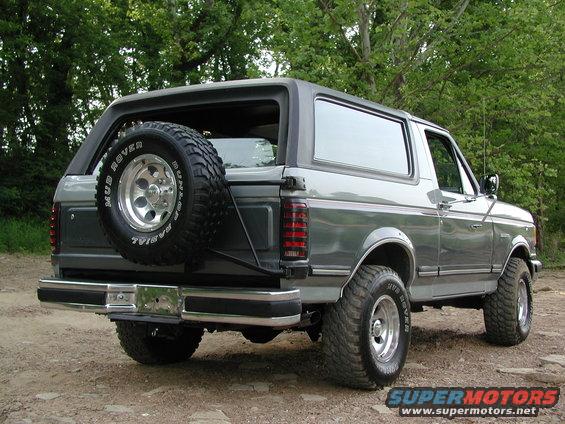 Gray 1989 Ford Bronco rear view with spare tire
