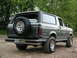 1989 Ford Bronco - This 1989 Ford Bronco is shown from the rear, a spare tire mounted externally.