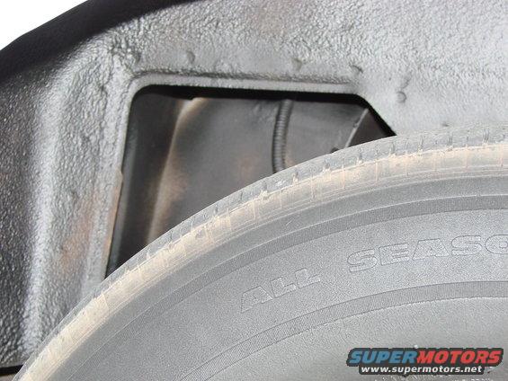 There was lots of white paint in the wheel wells.  I used undercoating to black it out.