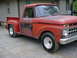 1965 Ford F-100 - This vintage pickup truck has a distinctive grille and a mismatched driver's side door.