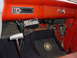 1965 Ford F-100 - The dashboard of an older truck shows a CB radio and an aftermarket stereo system.