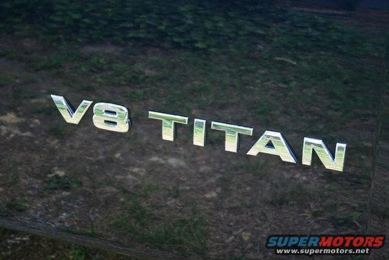 V8 TITAN badge on dark vehicle exterior