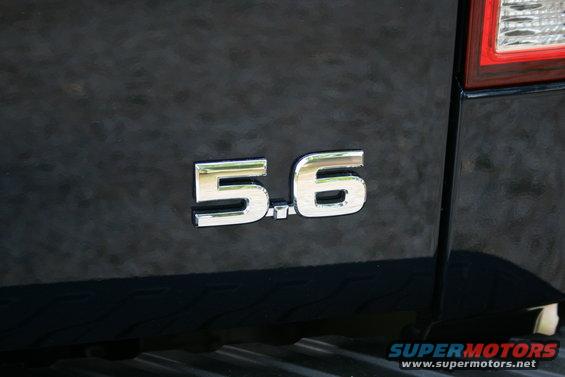 Close-up of 5.6 badge on the rear of a black 2007 Nissan Titan