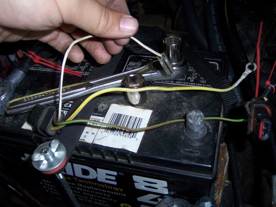The 3G plug. One of the wires plugs into the alt. The other goes on the same stud as the charge cable. The last (green) wire gets spliced into the original wiring. EASY!