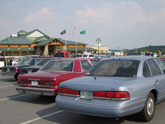 Rear view of a light blue 1991 Ford Crown Victoria LTD with a license plate reading 195 2187