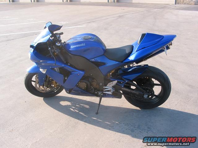 Blue Kawasaki motorcycle side view