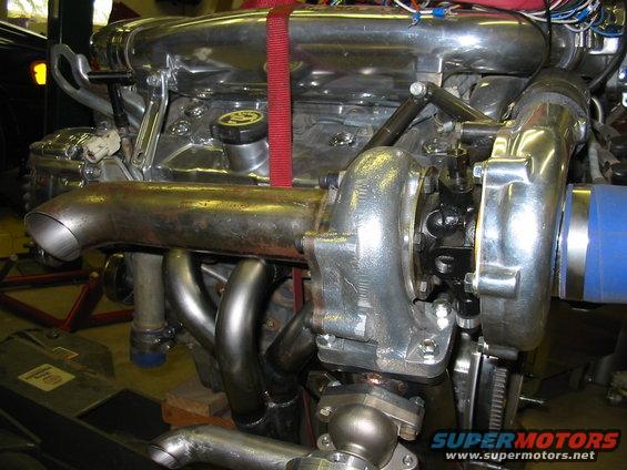twin-turbocharged engine with chrome intake manifold and exhaust headers