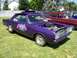 2002 Ford Mustang - Custom purple drag car with hood open, parked on grass next to a red station wagon.