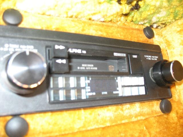 Alpine car stereo with CD player and large volume knob