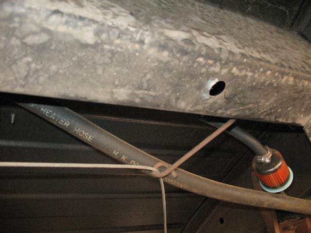 Heater hose with text 'HEATER HOSE H. K. P.' and a small fuel filter attached
