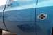 1976 Chevrolet C/K Pickup - This 1976 Chevrolet C/K Pickup features custom pinstripe flames on its side door, accented by the iconic Chevrolet emblem.
