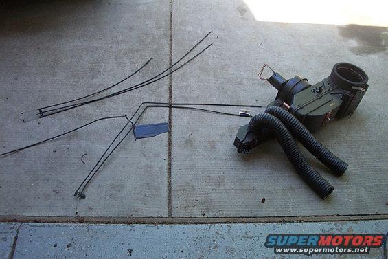 Heater core and ducting assembly with hoses on concrete