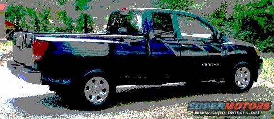 Dark blue 2007 Nissan Titan pickup truck, 3/4 front view