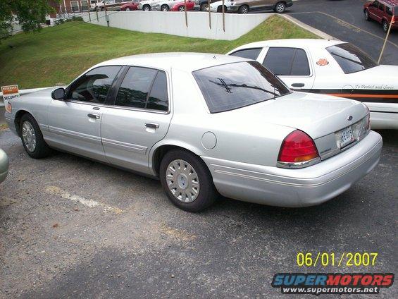 Silver 2002 Ford Crown Victoria, 3/4 front view