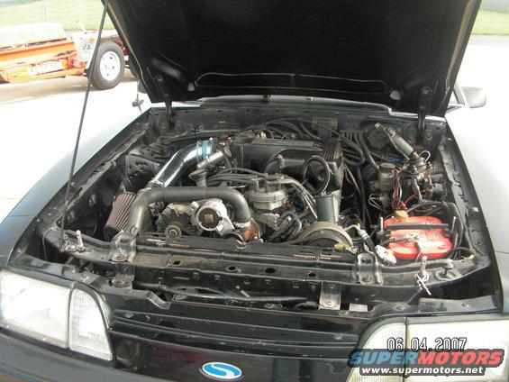 1988 Ford Mustang engine bay with hood open, showing V8 engine and intake. Date stamp 06/04/2007