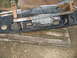 1996 Dodge 2500 - Winch and bumper assembly, possibly for a truck, resting on wooden pallets.