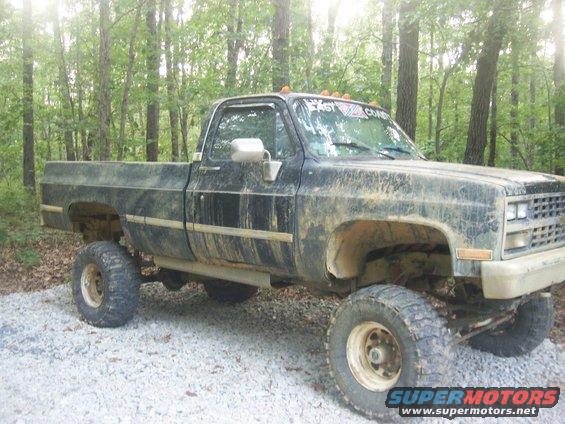 87 chevy V 30 1 ton,14 bolt in back,dana 60 in front,454 engine,4-speed trans,NP 205 transfer case,8" suspension lift,3" body lift