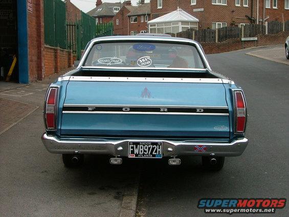 Blue 1970 Ford Ranchero rear view with chrome bumper and license plate FWB972H
