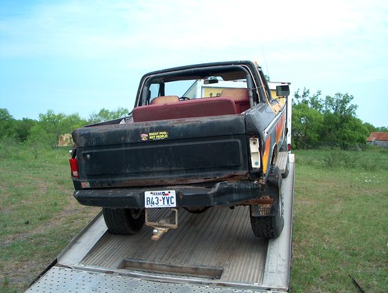 1978 Ford Bronco on a tow truck, rear view. Texas license plate B43-YVC