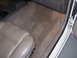 1995 Ford Taurus - Interior view of a car, focusing on the floor and passenger seat area.