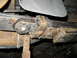 2001 Ford Excursion - This shows how the front of the leaf sneaks past the variable rate leaf and behind the riveted clamp.