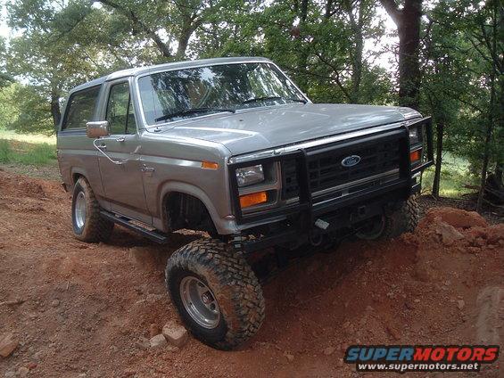 bronco-dirt-002.jpg Here it is with some custom bumpers, a 4" ttb lift with tuff country springs, and rear add a leaf.