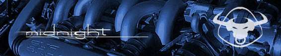 Close-up of engine components with the word 'midnight' and a bull logo
