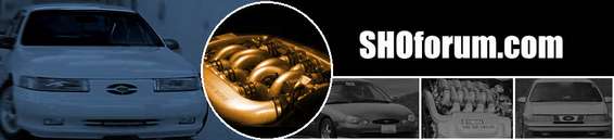 Close-up of a gold-colored intake manifold, with a white car and other images on a black background with SHOforum.com text