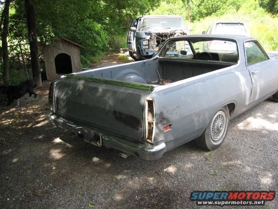 rear view -just small dent in chrome on the uuper tailgate molding & by the right taillight housing
