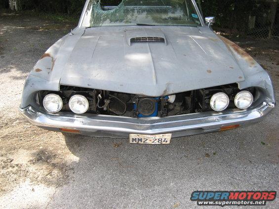 front view -small dent in nose of hood-fixable