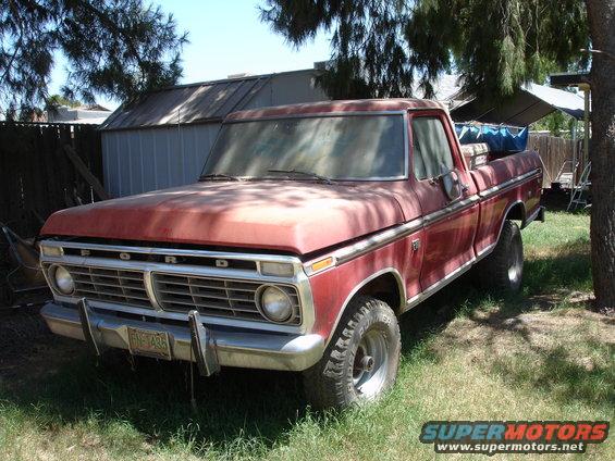 Red 1977 Ford F-150 pickup truck, 3q-front view